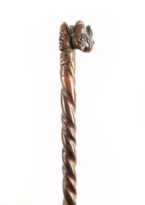 Lot 674 - A 19TH CENTURY CARVED FRUITWOOD FOLK ART WALKING STICK