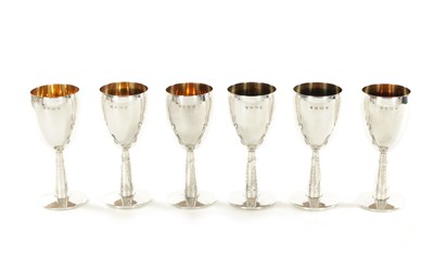 Lot 430 - A SET OF SIX 20TH CENTURY SILVER AND SILVER GILT GOBLETS