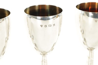 Lot 430 - A SET OF SIX 20TH CENTURY SILVER AND SILVER GILT GOBLETS