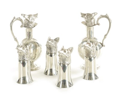 Lot 894 - A 20TH CENTURY SET OF POLISHED PEWTER FOX HUNTING DECANTERS AND STIRRUP CUPS IN THE STYLE OF GUCCI