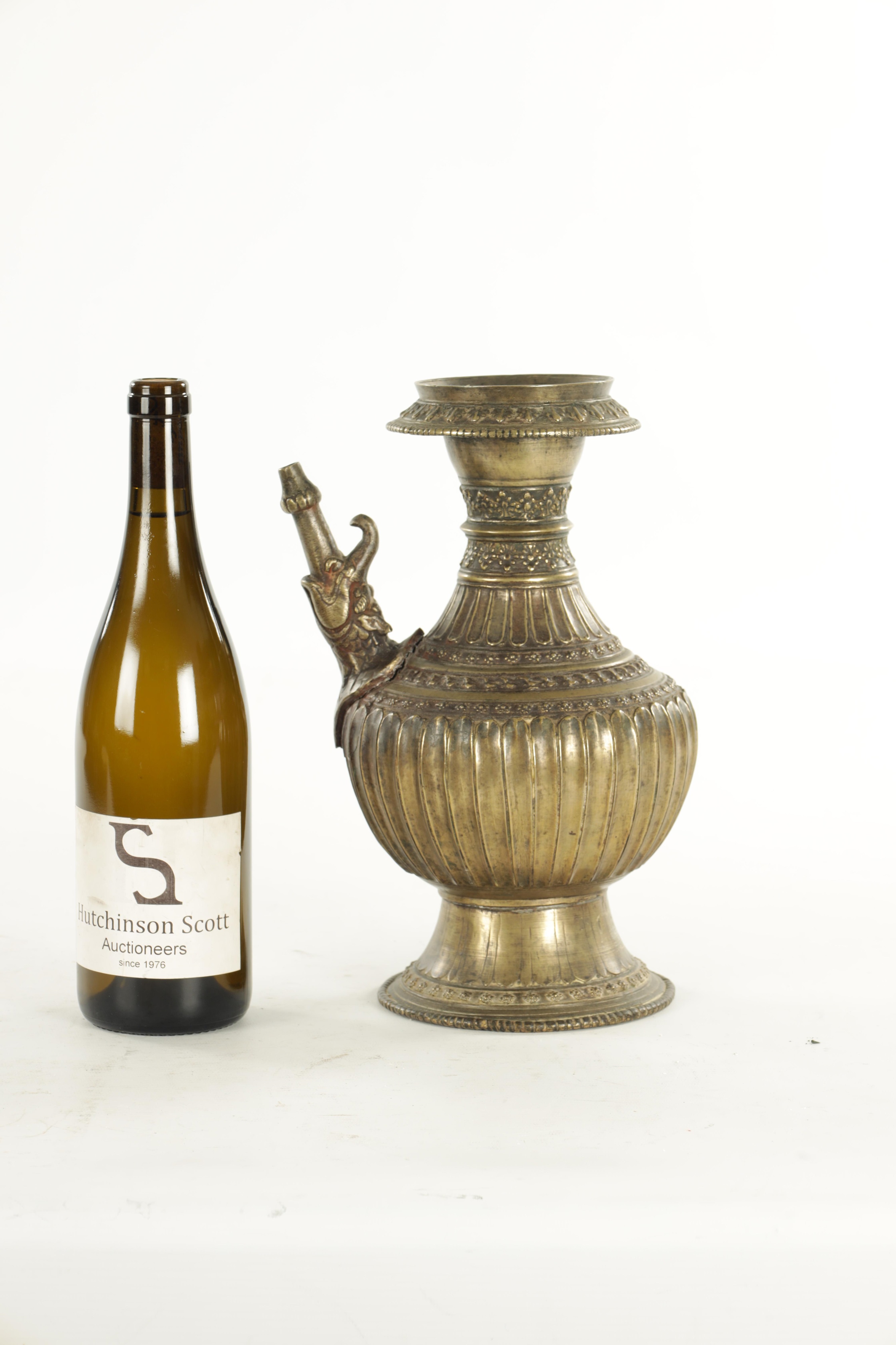 Lot 129 - AN EARLY INDIAN ISLAMIC BRONZE HUKA BASE