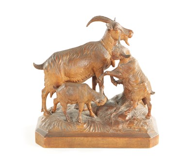 Lot 1342 - A 19TH CENTURY CARVED LINDEN WOOD BLACK FOREST GROUP OF THREE GOATS