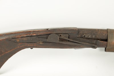 Lot 572 - AN EARLY 19TH CENTURY MATCHLOCK LONG BARRELLED GUN