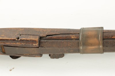 Lot 572 - AN EARLY 19TH CENTURY MATCHLOCK LONG BARRELLED GUN