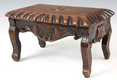 Lot 795 - A 19TH CENTURY CARVED WALNUT STOOL with...