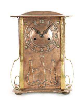 Lot 1056 - AN ARTS AND CRAFT COPPER AND BRASS MANTEL CLOCK