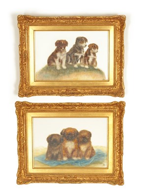Lot 34 - BESSIE BAMBER (1970-1810) A RARE PAIR OF EARLY 20TH CENTURY HANGING PLAQUES PAINTED WITH PUPPIES