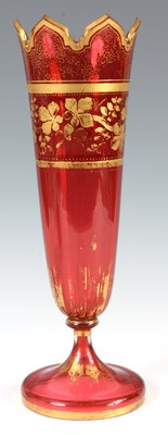 Lot 8 - A LATE 19TH CENTURY BOHEMIAN RUBY GLASS GILT...