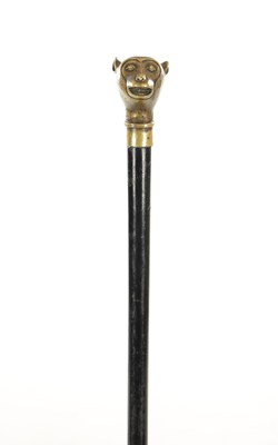 Lot 732 - A LATE 19TH CENTURY BRASS AND EBONY WALKING STICK