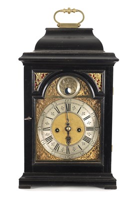 Lot 1149 - SIMON DE CHARMES, LONDON. A GEORGE I EBONISED QUARTER REPEATING BRACKET CLOCK OF SMALL PROPORTIONS