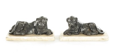 Lot 876 - A PAIR OF REGENCY PAINTED LEAD RECUMBENT LIONS IN THE MANNER OF THOMAS HOPE