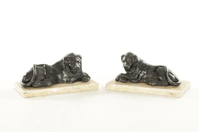 Lot 876 - A PAIR OF REGENCY PAINTED LEAD RECUMBENT LIONS IN THE MANNER OF THOMAS HOPE