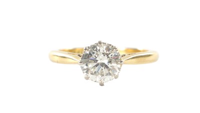 Lot 380 - A LADIES 18CT GOLD DIAMOND SOLITAIRE RING