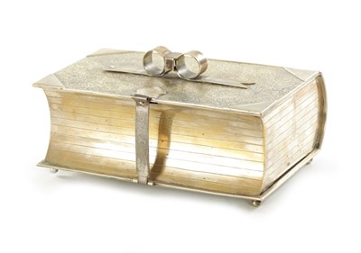 Lot 470 - A LATE 19TH CENTURY SILVER PLATED NOVELTY BISCUIT BOX FORMED AS A BOOK