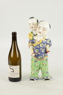 Lot 94 - A LATE 19TH CENTURY CHINESE PORCELAIN FIGURE
