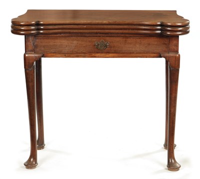 Lot 1348 - A GEORGE II FIGURED MAHOGANY TRIPLE TOP FOLD-OVER GAMES TABLE