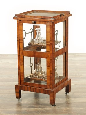 Lot 1453 - AN UNUSUAL 19TH CENTURY FIGURED WALNUT BIEDERMIER LIQUOR/SILVER PLATED TEA CABINET