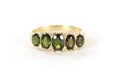 Lot 235 - AN 18CT GOLD TOURMALINE AND DIAMOND RING