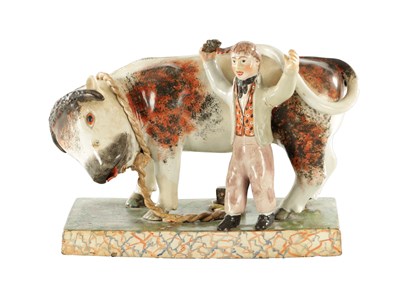 Lot 266 - A 19TH CENTURY STAFFORDSHIRE BULL BAITING GROUP