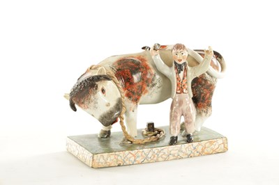 Lot 266 - A 19TH CENTURY STAFFORDSHIRE BULL BAITING GROUP