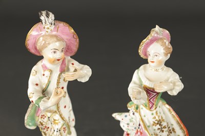 Lot A PAIR OF 18TH CENTURY BOW FIGURES