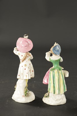 Lot A PAIR OF 18TH CENTURY BOW FIGURES