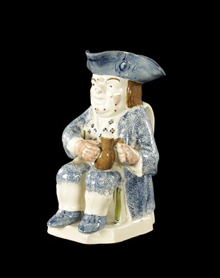 Lot 117 - AN EARLY 18TH CENTURY STAFFORDSHIRE TOBY JUG