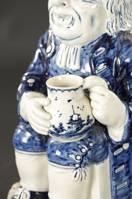 Lot 341 - AN EARLY 19TH CENTURY STAFFORDSHIRE TOBY JUG