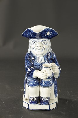 Lot 341 - AN EARLY 19TH CENTURY STAFFORDSHIRE TOBY JUG