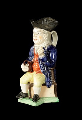 Lot 232 - A LATE 19TH CENTURY COPY OF A STAFFORDSHIRE SQUIRE TOBY JUG