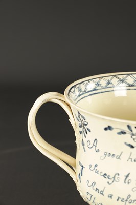 Lot 48 - A RARE LATE 18TH CENTURY LEEDS CREAMWARE LOVING CUP DATED 1780