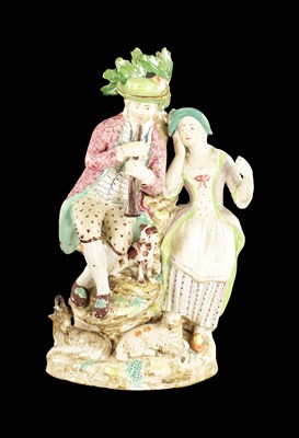 Lot 106 - AN EARLY 19TH CENTURY STAFFORDSHIRE RALPH WOOD STYLE FIGURE GROUP OF THE FLUTE PLAYER