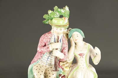 Lot 106 - AN EARLY 19TH CENTURY STAFFORDSHIRE RALPH WOOD STYLE FIGURE GROUP OF THE FLUTE PLAYER
