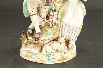 Lot 106 - AN EARLY 19TH CENTURY STAFFORDSHIRE RALPH WOOD STYLE FIGURE GROUP OF THE FLUTE PLAYER