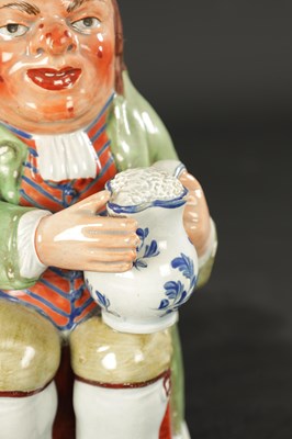 Lot 322 - AN EARLY 19TH CENTURY WALTON TOBY JUG