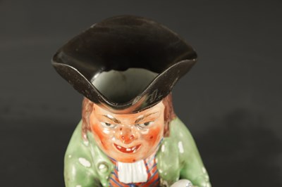 Lot 322 - AN EARLY 19TH CENTURY WALTON TOBY JUG