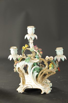 Lot 376 - A 19TH CENTURY MEISSEN THREE BRANCH FIGURAL CANDELABRA