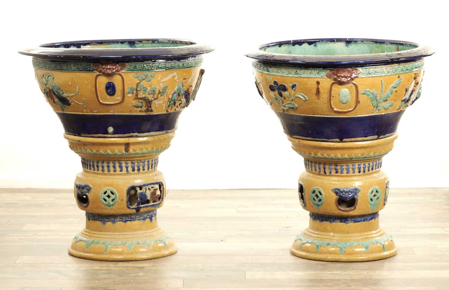 Lot 1299 - AN UNUSUAL PAIR OF 19TH CENTURY CHINESE POTTERY JARDINIERES ON STANDS