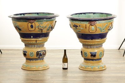 Lot 1299 - AN UNUSUAL PAIR OF 19TH CENTURY CHINESE POTTERY JARDINIERES ON STANDS