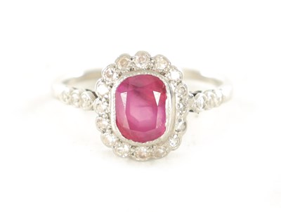 Lot 448 - A VINTAGE WHITE GOLD RUBY AND DIAMOND RING