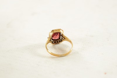 Lot 489 - A LADIES FRENCH 18CT GOLD GARNET AND DIAMOND RING