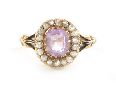 Lot 485 - A VINTAGE GOLD AMETHYST AND DIAMOND RING