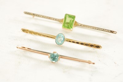 Lot 444 - THREE 9CT GOLD BAR BROOCHES