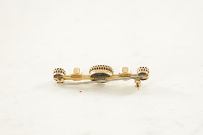 Lot 445 - A 9CT GOLD SAPPHIRE AND PEARL BAR BROOCH