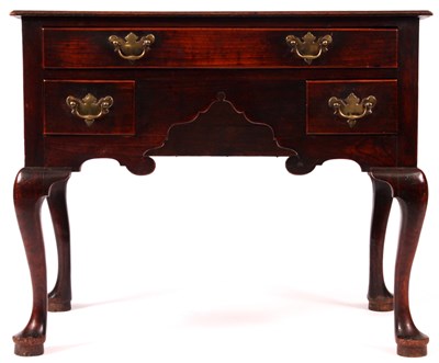 Lot 685 - A mid 18th Century Elm and Fruitwood LOWBOY...