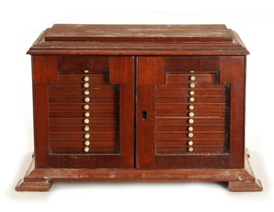 Lot 609 - A LATE 19TH CENTURY TABLE CABINET CONTAINING VARIOUS FISHING SALMON FLIES