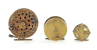 Lot 586 - THREE VINTAGE BRASS FISHING REELS