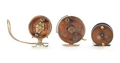 Lot 596 - A COLLECTION OF THREE 19TH CENTURY WOOD AND BRASS FISHING REELS