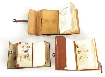 Lot 649 - THREE LEATHER FLY AND CAST WALLETS