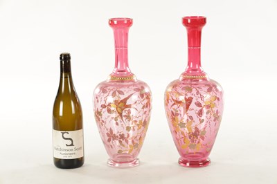 Lot 11 - A LARGE PAIR OF 19TH CENTURY CRANBERRY GLASS VASES